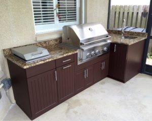 outdoor kitchen with grill in Brandon Fl